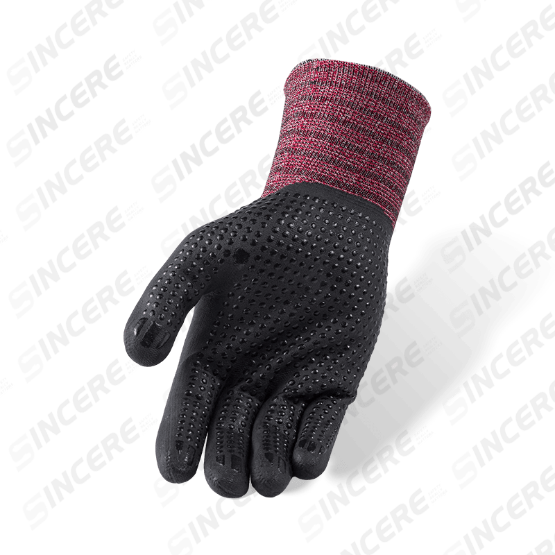 Gants en nylon élasthanne calibre 15 avec paume en micro-mousse en nitrile noir et poignée antidérapante à pois en nitrile
