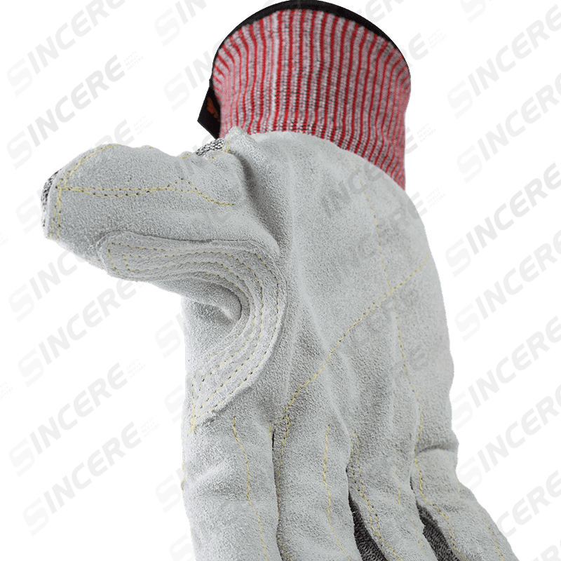 Gants résistants aux coupures ANSI A6 de calibre 13 avec paume en cuir (grain complet/fendu) et entrejambe renforcé pour le pouce — protection robuste contre les coupures en cuir Gants résistants aux coupures ANSI A6 de calibre 13 avec paume en cuir (grain complet/fendu) et entrejambe renforcé pour le pouce — protection robuste contre les coupures en cuir